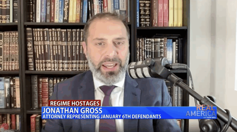 Prior to joining the Department of Justice, Jonathan Gross was an outspoken attorney for defendants charged in connection with the Jan. 6, 2021 attack on the U.S. Capitol. In September 2024, Gross appeared on the right-wing TV channel One America News Network, where the riot defendants were described in an on-screen chyron as "regime hostages."