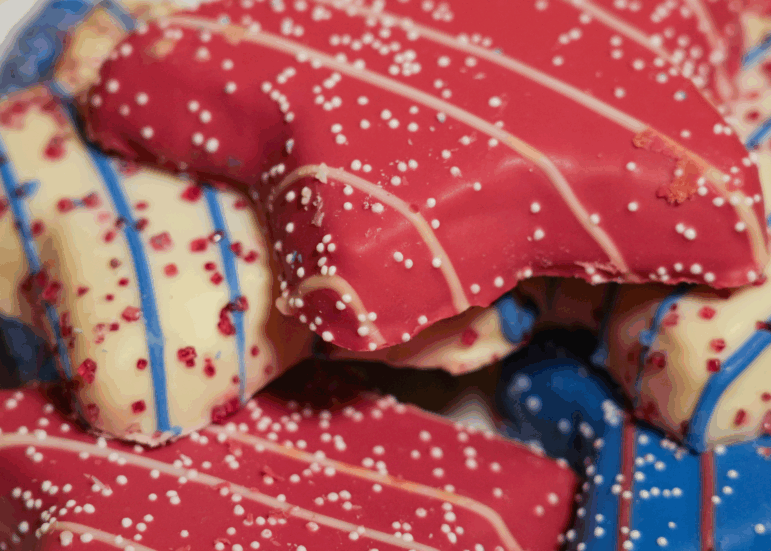 Scientists at Sam's Club replaced artificial dyes in this star-shaped iced cookie with natural alternatives, but in a way that would keep the treat just as vividly colored.