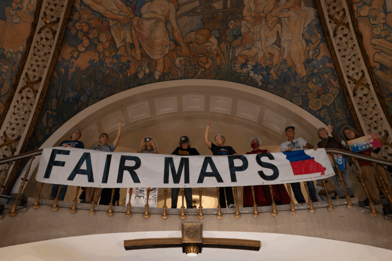 Demonstrators came to the Missouri capitol building this week to oppose the Trump-backed redistricting of congressional voting maps.