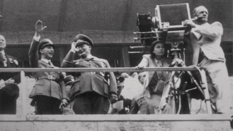 https://wbhm.org/wp-content/uploads/2025/09/5-riefenstahl-filming-olympia-next-to-goebbels-and-goering-1936-c-vincent-productions-800x450.png