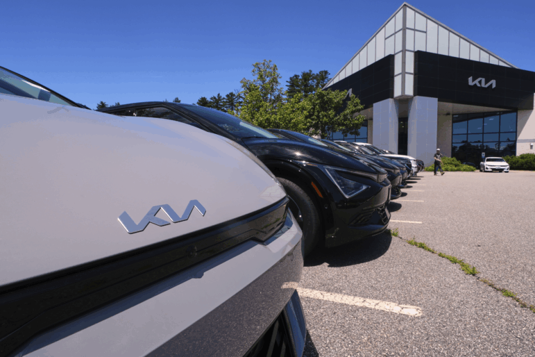 A selection of Kia EV6 electric sedans are displayed at a dealership in Manchester, N.H., in July. The EV6 is eligible for a federal tax credit worth up to $7,500 for buyers under a certain income cap. And like all electric vehicles, it's eligible for a $7,500 tax credit on a lease. But the tax credits are expiring on Sept. 30th.