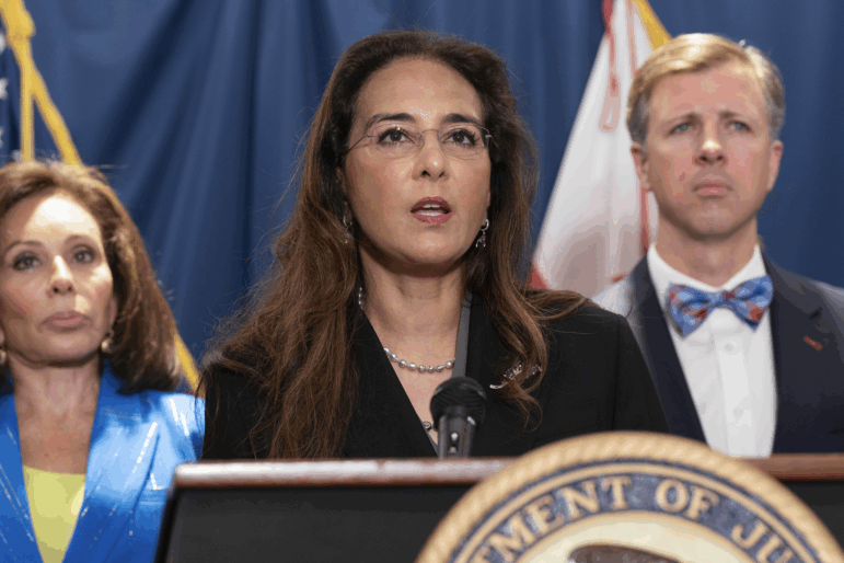 Harmeet Dhillon, head of the Justice Department's Civil Rights Division, speaks during a news conference on Aug. 7.