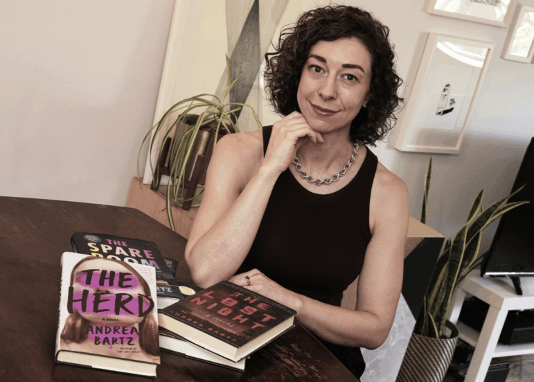 Thriller novelist Andrea Bartz is photographed in her home Thursday in the Brooklyn borough of New York City.