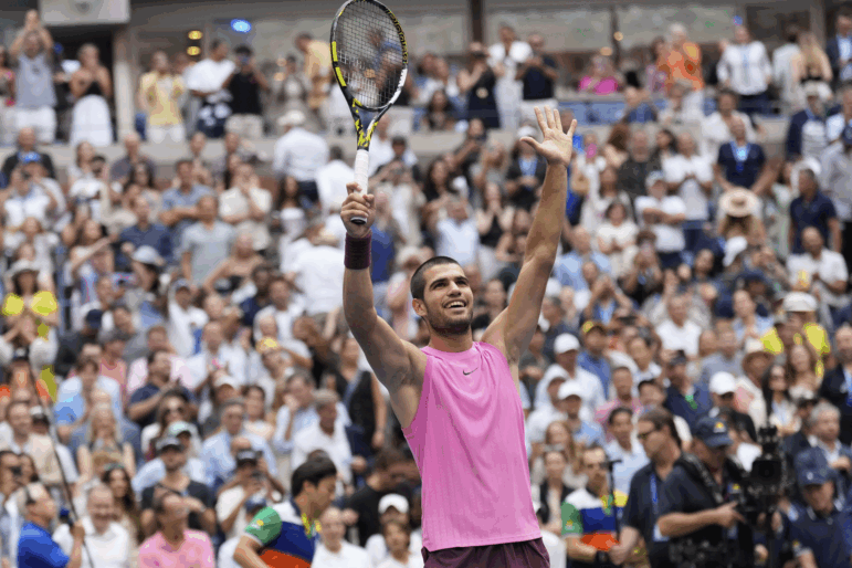 Carlos Alcaraz, of Spain, celebrates after defeating Novak Djokovic, of Serbia, during the men's singles semifinals of the U.S. Open tennis championships, on Friday.