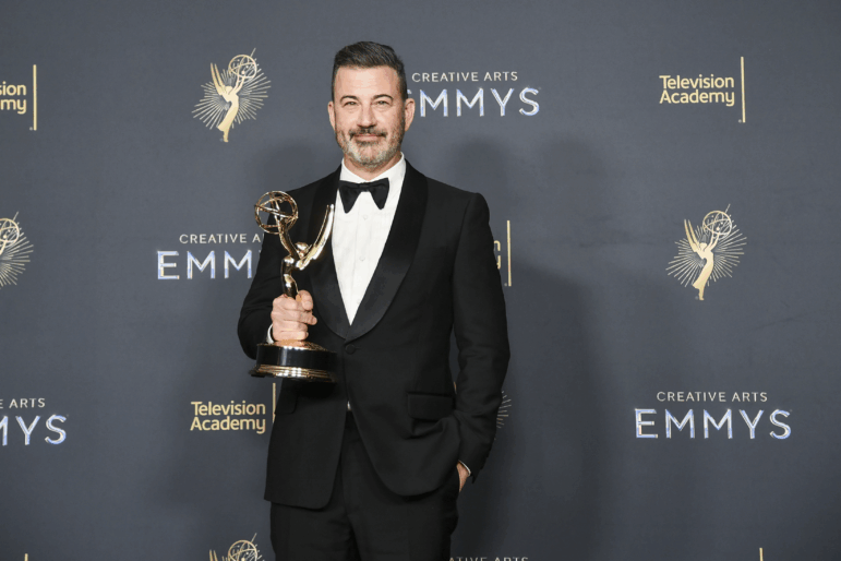 Jimmy Kimmel poses in the press room with the award for host for a game show for Who Wants to Be a Millionaire during night two of the Creative Arts Emmy Awards on Sunday, Sept. 7, 2025, at the Peacock Theater in Los Angeles.