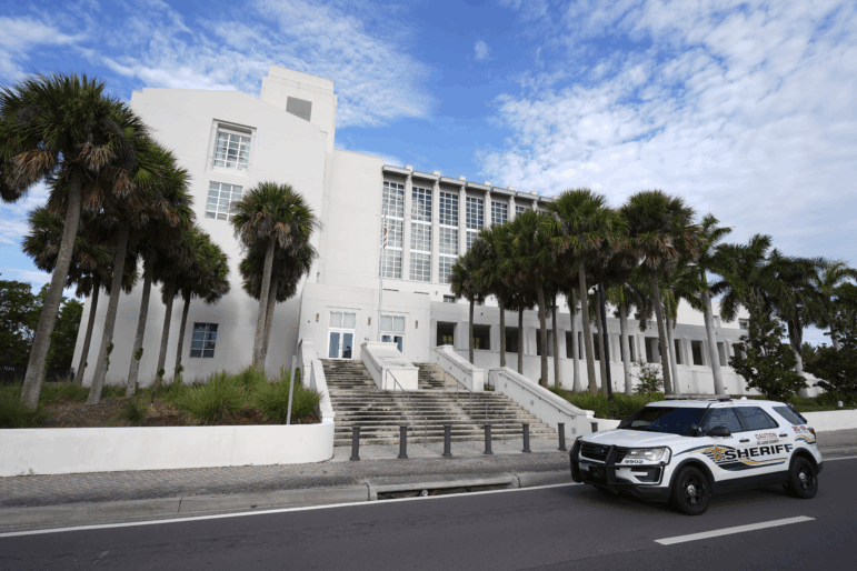 Opening statements began Thursday in the trial of Ryan Routh, charged with trying to assassinate Donald Trump while he played golf last year at his West Palm Beach course in Florida. Routh's trial is in federal court in Fort Pierce, Fla.