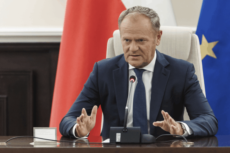 Polish Prime Minister Donald Tusk holds an extraordinary government meeting at the chancellery, with military and emergency services officials following violations of Polish airspace during a Russian attack in Warsaw Wednesday, Sept. 10, 2025.