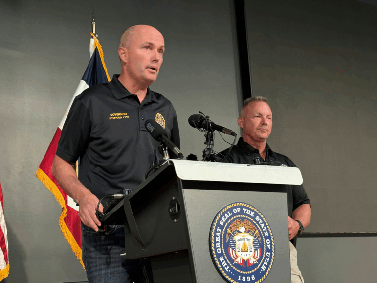 Utah Gov. Spencer Cox, left, speaks with Utah Valley University Chief of Police Jeff Long, right, at a press conference at the Keller Building on the Utah Valley University campus after Charlie Kirk was shot and died during Turning Point's visit to the university, Wednesday, Sept. 10, 2025, in Orem, Utah.