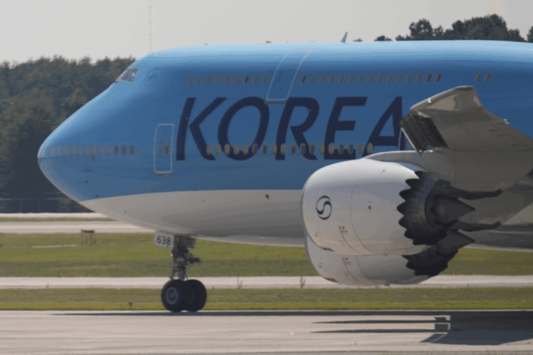 A Korean Air charter plane carrying Korean workers detained in immigration raid at Georgia factory leaves Hartsfield-Jackson International Airport in Atlanta bound for South Korea on Thursday.