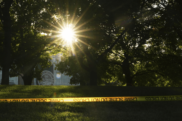 Crime scene tape surrounds the perimeter of Utah Valley University after Turning Point USA CEO and co-founder Charlie Kirk was shot and killed , Saturday, Sept. 13, 2025, in Orem, Utah. Social media is promoting different views of why the shooter acted.