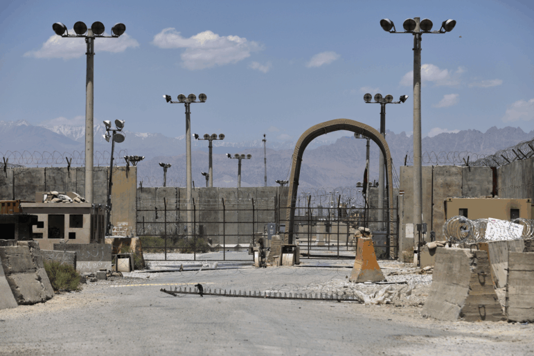 FILE - A gate is seen at the Bagram Air Base in Afghanistan, Friday, June 25, 2021. President Donald Trump has suggested he's working to reestablish a U.S. presence at Bagram Air Base in Afghanistan. That comes four years after America’s chaotic withdrawal from the country left the base in the Taliban’s hands.