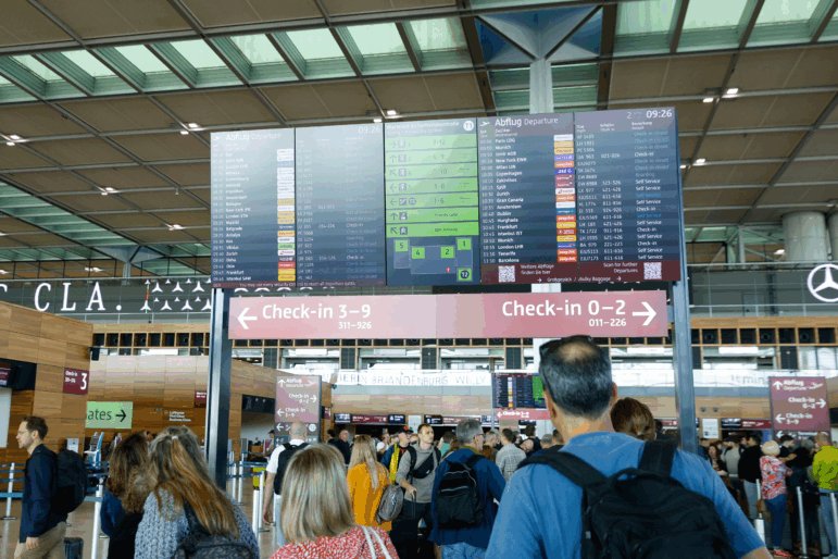 People at BER airport as a cyber attack has caused delays, in Berlin, Germany, on Saturday, Sept. 20, 2025. (Carsten Koall/dpa via AP)