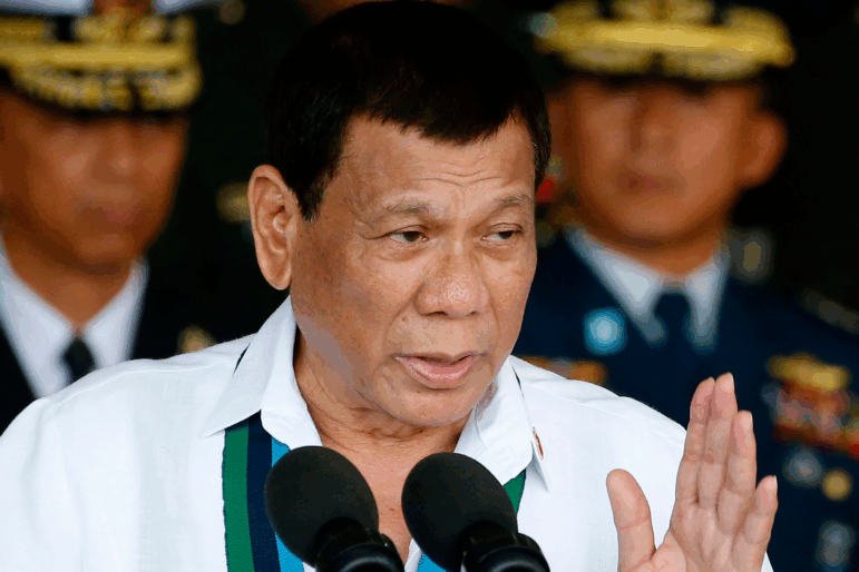 FILE - Philippine President Rodrigo Duterte addresses the troops during the 82nd anniversary celebration of the Armed Forces of the Philippines in suburban Quezon city northeast of Manila, Philippines on Dec. 20, 2017.