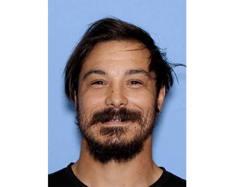 FILE - This undated photo provided by the Wenatchee Police Department shows Travis Caleb Decker, who was wanted in connection with the deaths of his three daughters.