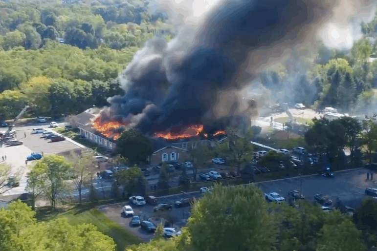 In this image taken from video released by Julie J, @Malkowski6April, Massive flames and smoke rise from The Church of Jesus Christ of Latter-day Saints in Grand Blanc, about 50 miles north of Detroit, Sunday, Sept. 28, 2025.