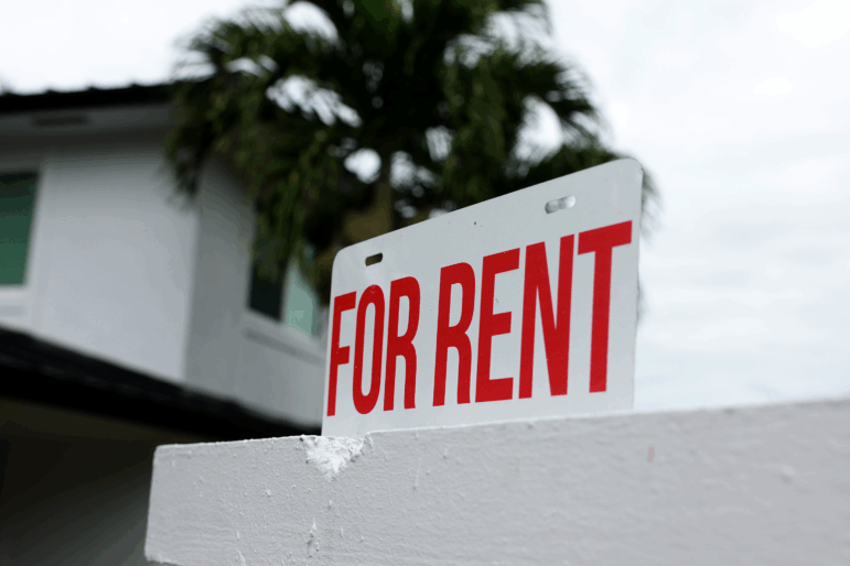 A "For Rent" sign is posted in front of a home on December 12, 2023, in Miami.