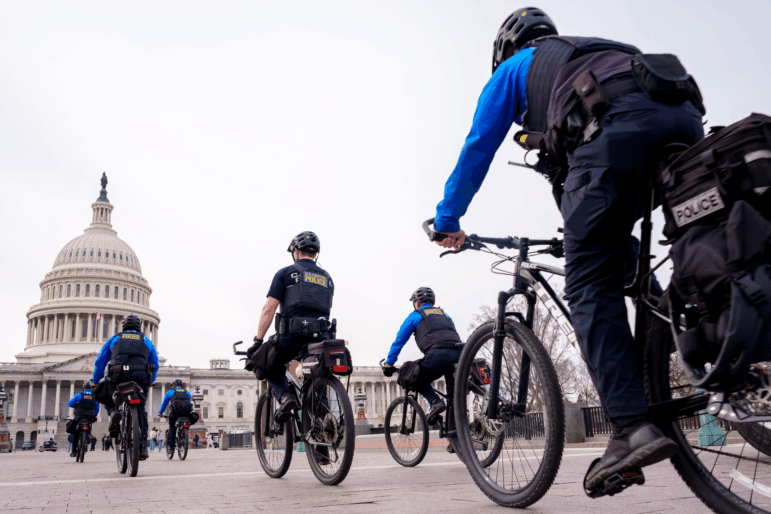 WASHINGTON, DC - MARCH 4: The Dome of the U.S. Capitol Building is visible as U.S. Capitol Police bicycle along the East Front of the U.S. Capitol Building on March 4, 2025 in Washington, D.C.