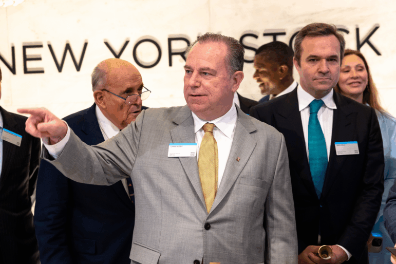 Chris Ruddy, the CEO of Newsmax, prepares to ring the opening bell at the New York Stock Exchange during morning trading on April 03, 2025. On Wednesday, Newsmax sued larger rival Fox, claiming it was using its power to illegally control the market in right-wing news channels.