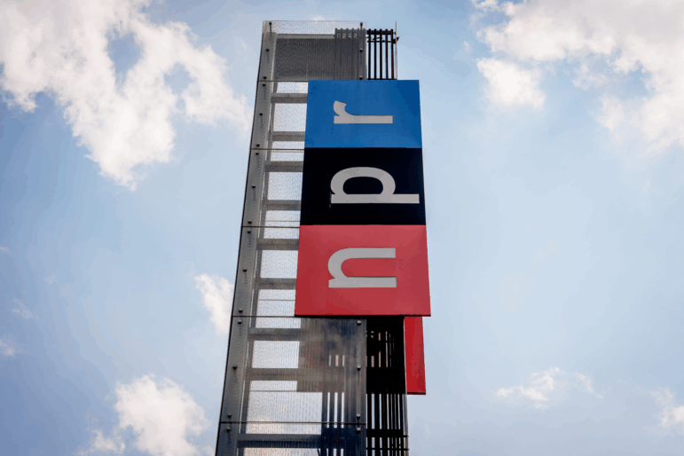 View of the sign outside National Public Radio headquarters on July 22, 2025 in Washington, DC.