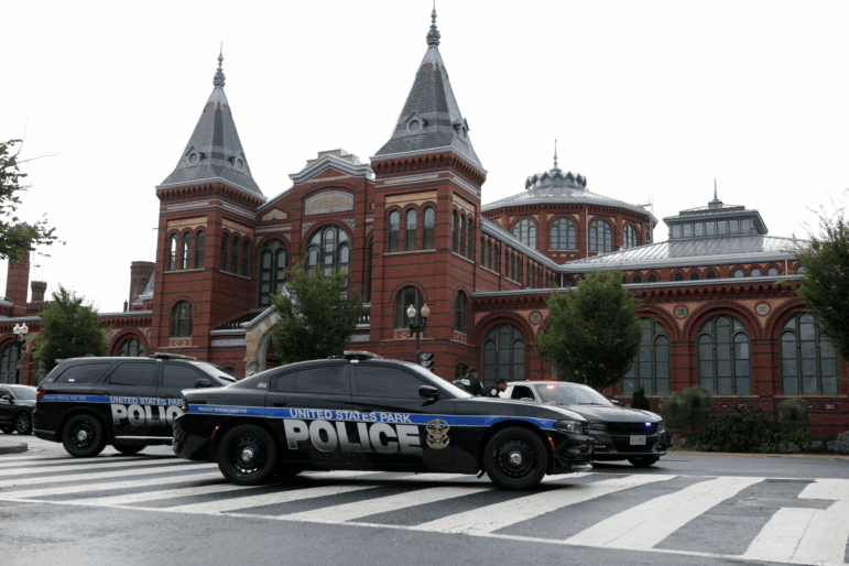Members of the U.S. Park Police guard an entrance to the 9th Street tunnel in front of the Smithsonian Castle on Aug. 13, 2025, in Washington, D.C., after the Trump administration initiated a federal takeover of D.C. police and deployed the National Guard.