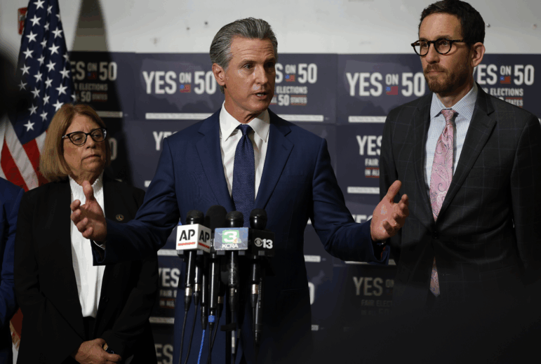 California Gov. Gavin Newsom speaks during a news conference to kick off the Yes on 50 campaign at the California Democratic Party headquarters on Aug. 21 in Sacramento. The ballot measure will ask the state's voters to approve a new congressional map created by Democrats.