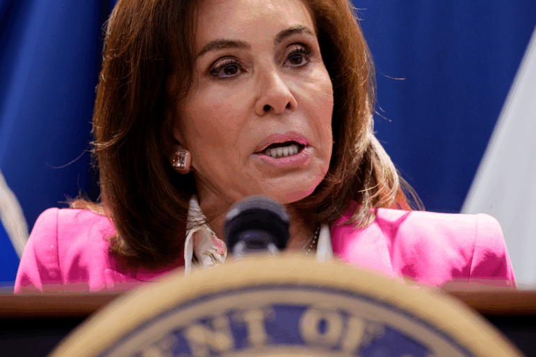 Jeanine Pirro, the U.S. attorney for the District of Columbia, speaks from behind a lectern during a news conference on August 26, 2025, in Washington, D.C.