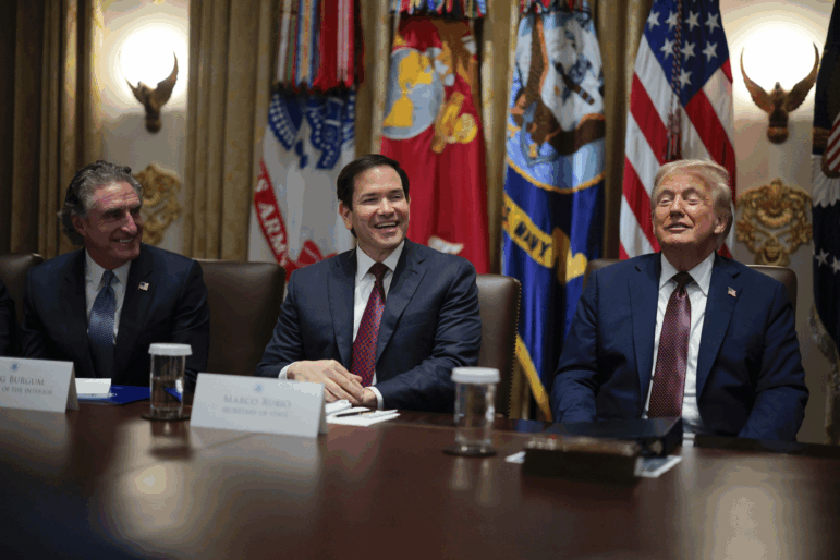 U.S. Secretary of State Doug Burgum, Secretary of State Marco Rubio and President Donald Trump sit together during a Cabinet meeting in the Cabinet Room of the White House on August 26, 2025 in Washington, DC. This is the seventh cabinet meeting of Trump's second term.