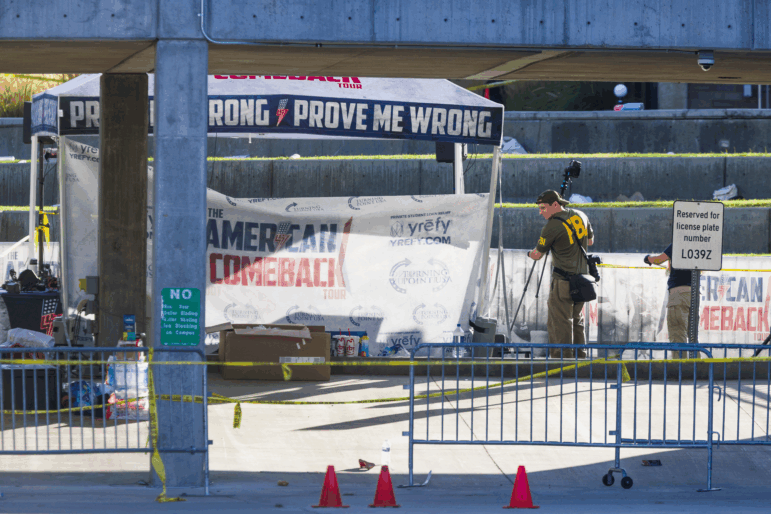 OREM, UTAH - SEPTEMBER 11: FBI agents walk through the courtyard at Utah Valley University as authorities search for the man who killed political activist Charlie Kirk on September 11, 2025, in Orem, Utah. Kirk, founder of Turning Point USA, was speaking at his "American Comeback Tour" when he was shot in the neck and killed.