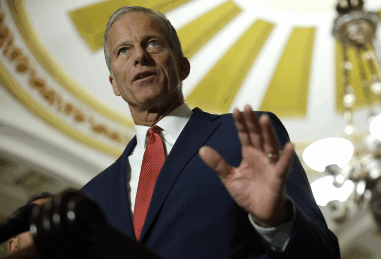 Senate Majority Leader John Thune, R-S.D., speaks to the media following a Senate policy luncheon at the U.S. Capitol on Tuesday. Senate Republicans have voted to change the chamber's rules in order to speed confirmation of President Trump's nominees.