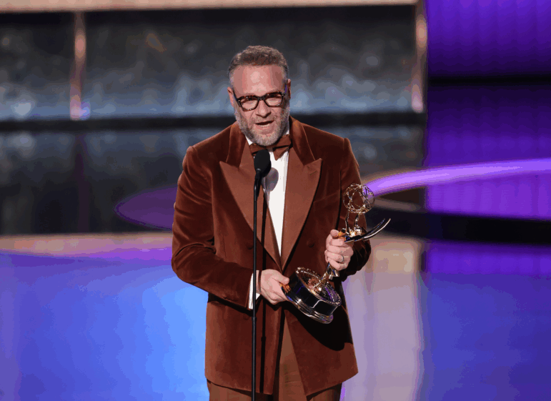 Seth Rogen accepts the Emmy for Outstanding Lead Actor in a Comedy Series for his performance in The Studio at the 77th Primetime Emmy Awards.