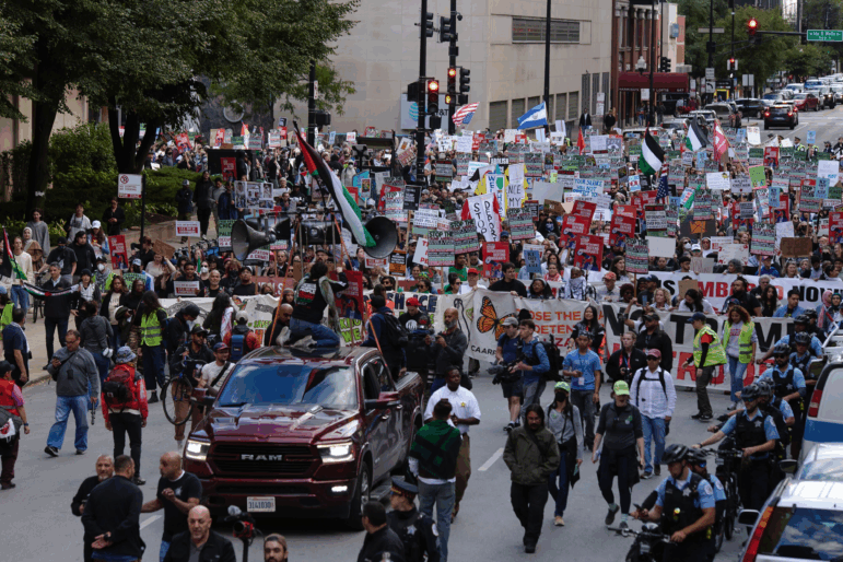Demonstrators in Chicago protested on Saturday against the Trump plan to deploy the National Guard in the city.
