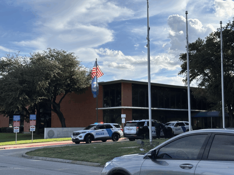 Law enforcement agents secure an immigration facility in Dallas on September 24, 2025 after a gunman shot at the facility, killing two detainees and injuring a third one.