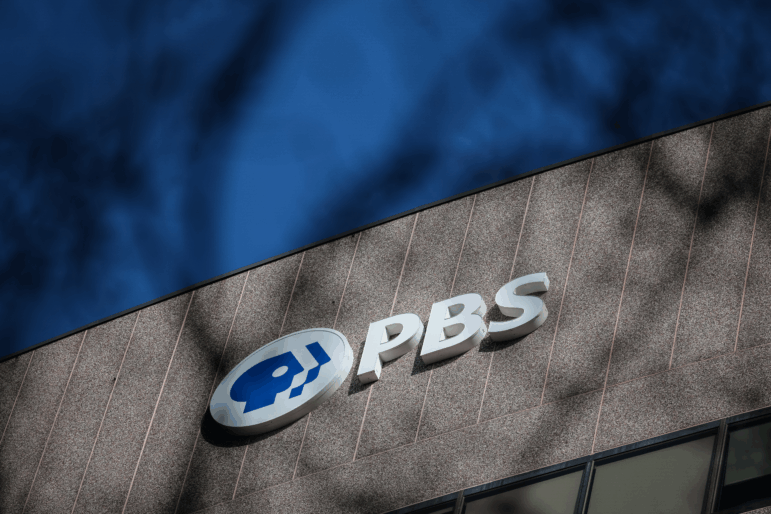 A sign for the Public Broadcasting Service is seen on its building headquarters on Feb. 18, 2025 in Arlington, Va.