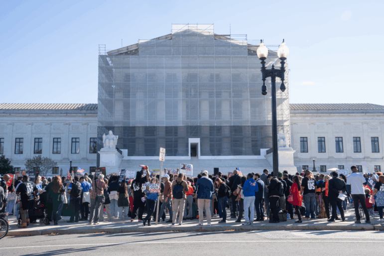 People gather in support of minority voting rights outside the U.S. Supreme Court in Washington, D.C., on Wednesday.