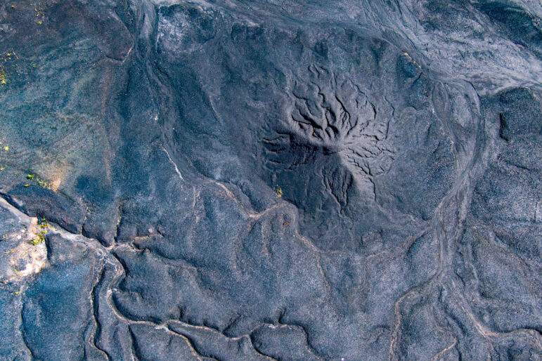 Coal and coke waste is seen piled high at an industrial site in Alabama.