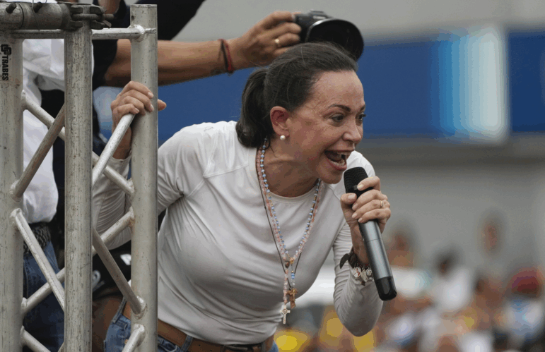 Opposition leader Maria Corina Machado, who has been banned from running for office, campaigns for presidential candidate Edmundo González, in Maracaibo, Venezuela, Thursday, May 2, 2024.