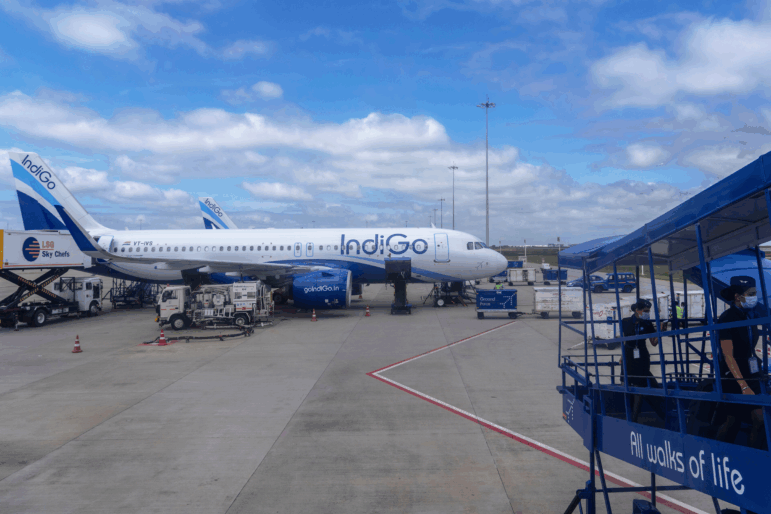 FILE - An aircraft of India's budget airline IndiGo is serviced at Kempegowda International Airport in Bangalore, India, Sept. 16, 2022.
