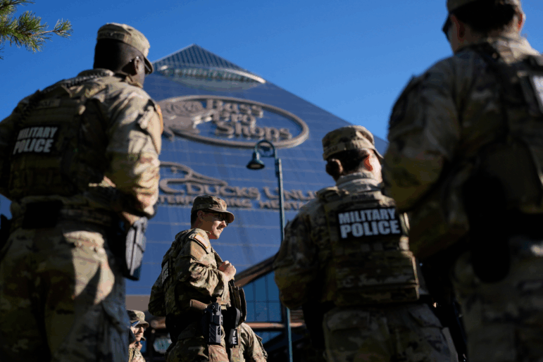 Members of National Guard patrol outside a Bass Pro Shops on Oct. 10 in Memphis, Tenn.