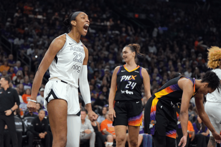 Las Vegas Aces center A'ja Wilson reacts after scoring against the Phoenix Mercury during Game 4 of the WNBA basketball finals on Friday in Phoenix. Wilson scored 31 points as the Aces beat the Mercury 97-86 to sweep their way to a third championship in four seasons.