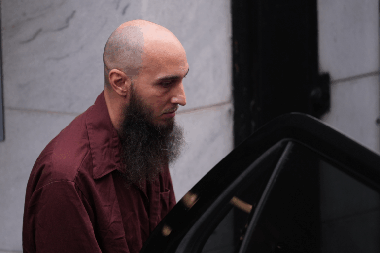 Cody Balmer, accused of setting a fire at Pennsylvania Gov. Josh Shapiro's official residence, leaves Dauphin County Courthouse on Oct. 14, 2025 in Harrisburg, Pa.