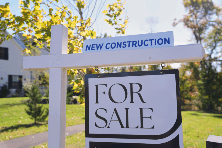 A sign is posted for a new home for sale in Ambler, Pa., Thursday, Oct. 16, 2025.