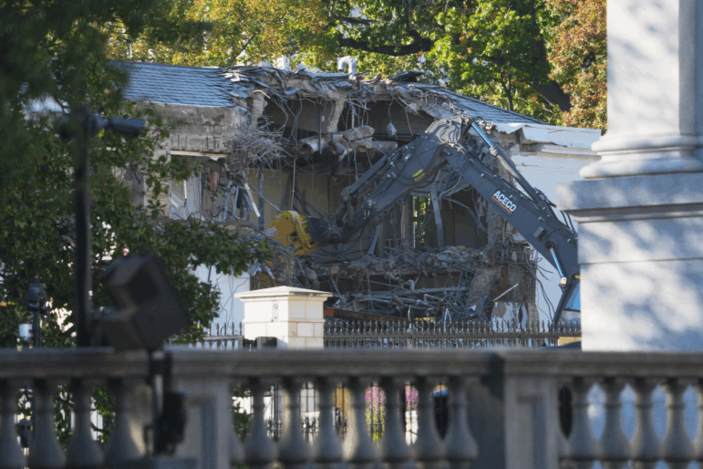 Work begins on the demolition of a part of the East Wing of the White House on Monday in Washington, D.C., before construction of a new ballroom.