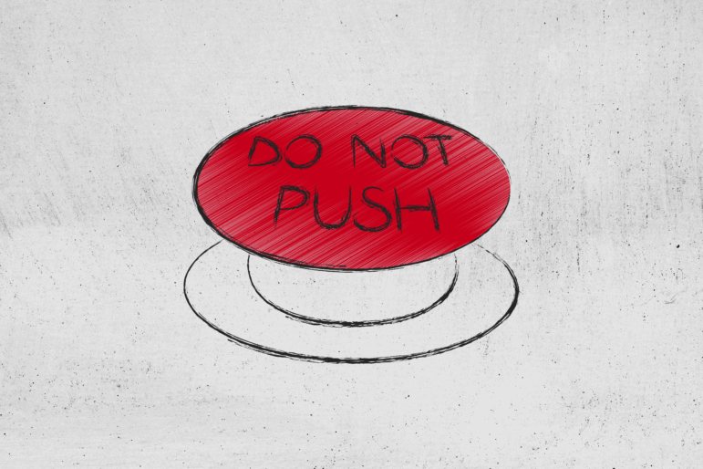 This illustration shows a big red button that says "DO NOT PUSH" in all capital letters on it.