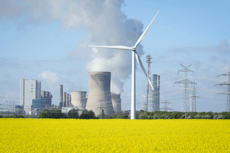 Wind turbines stand next at the Neurath coal-fired power plant on April 15, 2024, in Ingendorf, Germany.