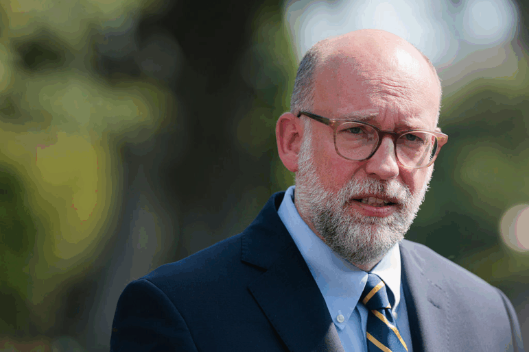 Russell Vought, director of the Office of Management and Budget (OMB), speaks with reporters outside of the West Wing of the White House in July 2025.