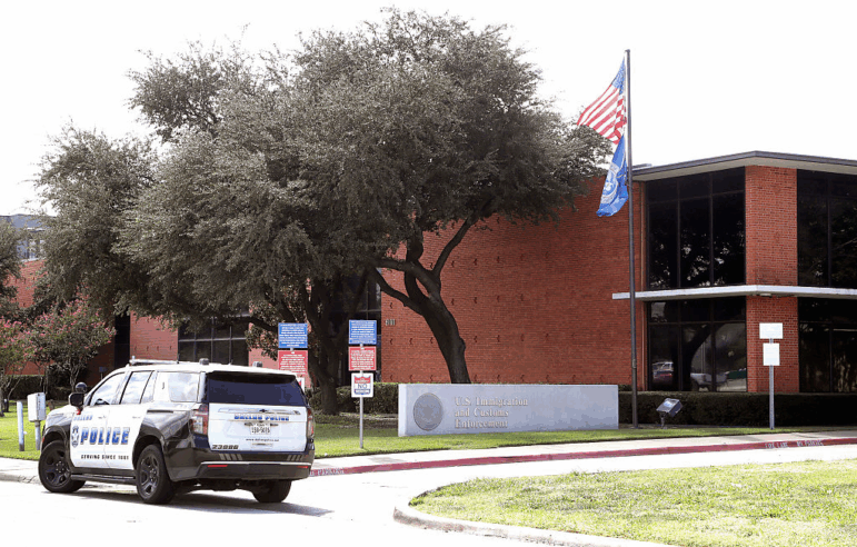 Dallas Police work the scene where a shooter opened fire on a U.S. Immigration and Customs Enforcement facility, September 24, 2025 in Dallas, Texas.