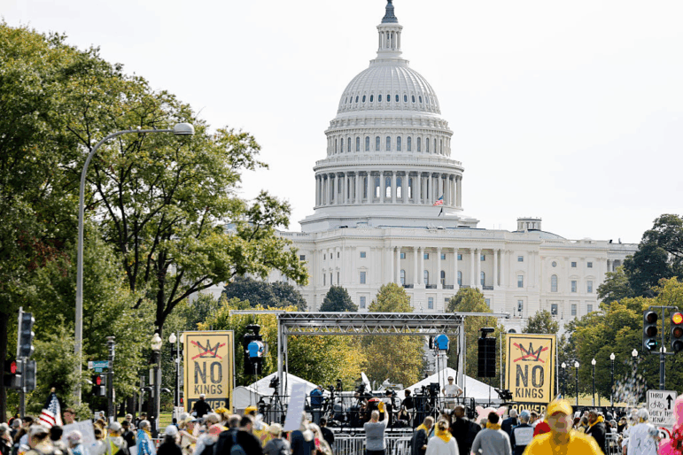 People protest in Washington, D.C. as part of the 'No Kings' rallies in Washington, D.C. on Oct. 18, 2025.