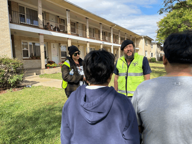 Organizers with the People's Patrol talk to immigrant kids in Hanover Park, a suburb of Chicago, on October 10, 2025.