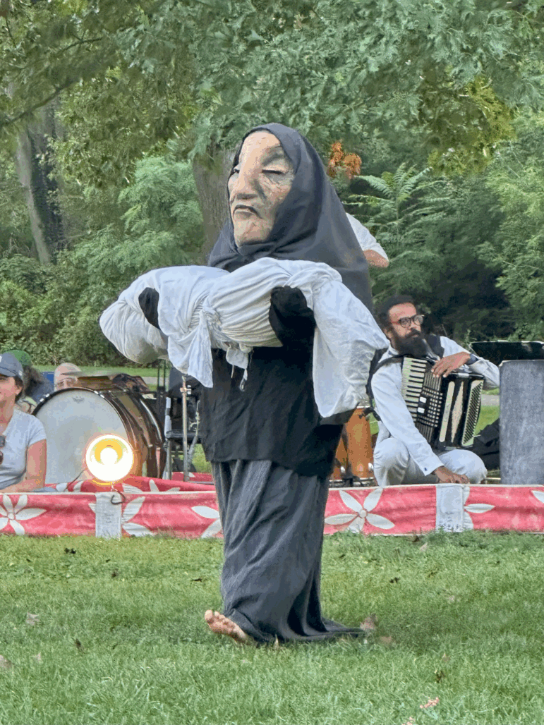 A puppeteer plays a mourning mother in Gaza during a performance of Our Domestic Resurrection Revolution In Progress! in Ypsilanti, Mich.