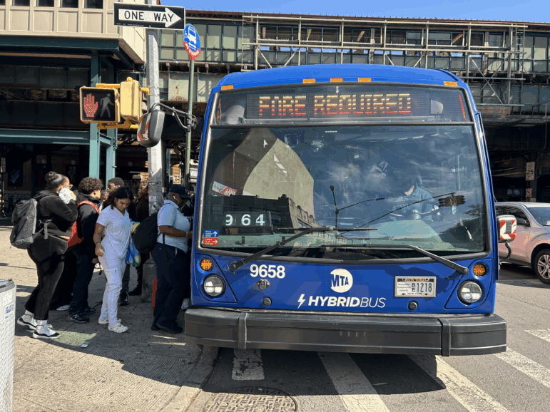 Riders board the Bx18 in the Bronx, one of five bus lines in New York City that were free last year under a temporary pilot program.